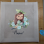 Brunette Girl with kitten and blue flowers custom tote sack